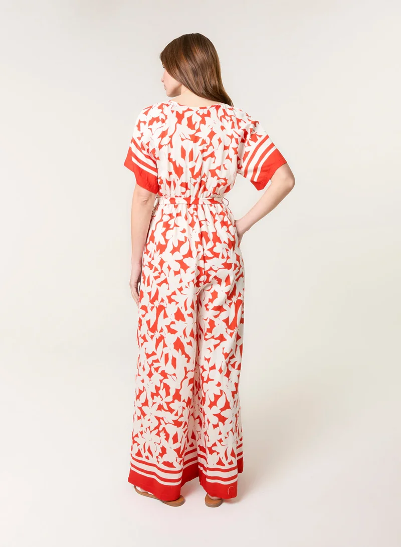 بلو فانيلا Tropical Print Wrap Belted Waist Jumpsuit